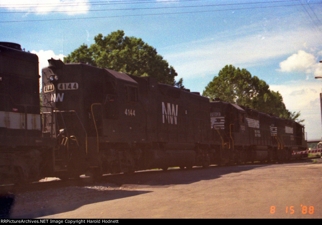 N&W 4144 follows a pair of GP50's headed west